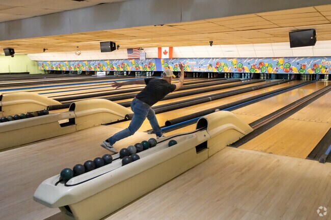 The rumble of bowling balls and the cheerful clatter of pins provide a familiar soundtrack to evenings in Brewer, where the local bowling alley serves as a vibrant community hub.