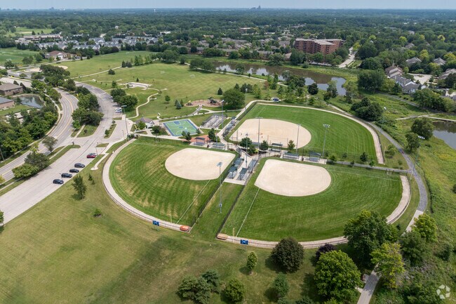 Erickson Elementary School is located right next to an expansive park with multiple fields.