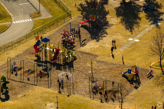 Hill And Plain Elementary School has a large playground for students.