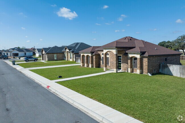 Row of brick style homes in La Villa, Tx.