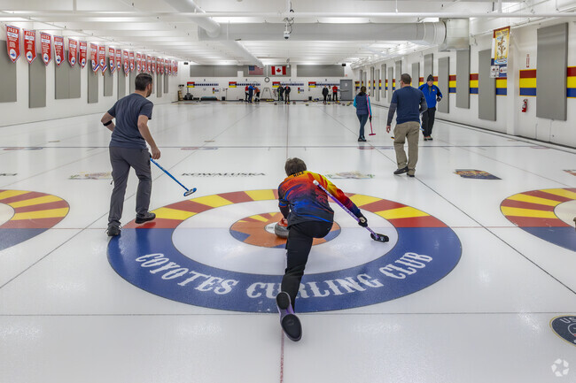 Experience the thrill of curling at Coyotes Curling Club, near Mitchell Park East.