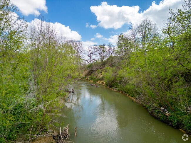 The San Antonio River flows by Floresville, TX.