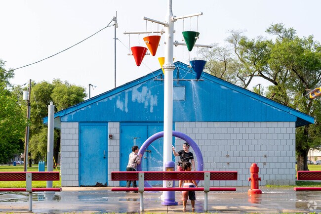 Children from Meadowlawn can enjoy the splash pad at Douglas Park, making it a fun and engaging spot for outdoor play.