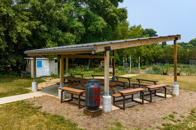 There is a shaded outdoor classroom area in the back of John Muir Elementary School.