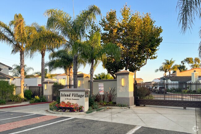 Secure entry gates welcome visitors to Island Village.