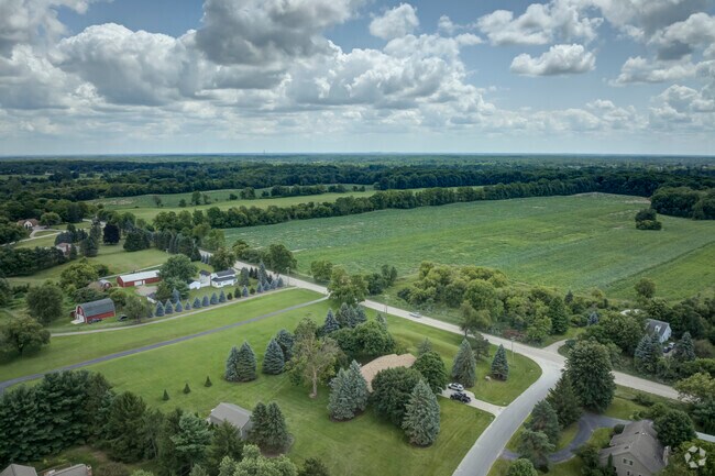 View of Salem neighborhood with large homes and farmland.