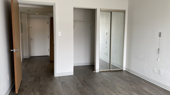 Bedroom- mirrored door closet space