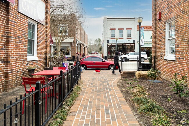 A quaint walking path weaves through the charming downtown area of Smithfield.