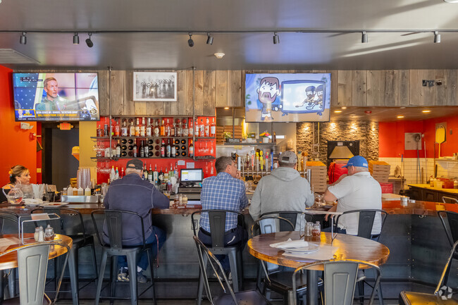 Craft pizza and relaxed vibes at Max & Leo's Pizza in Chelmsford.
