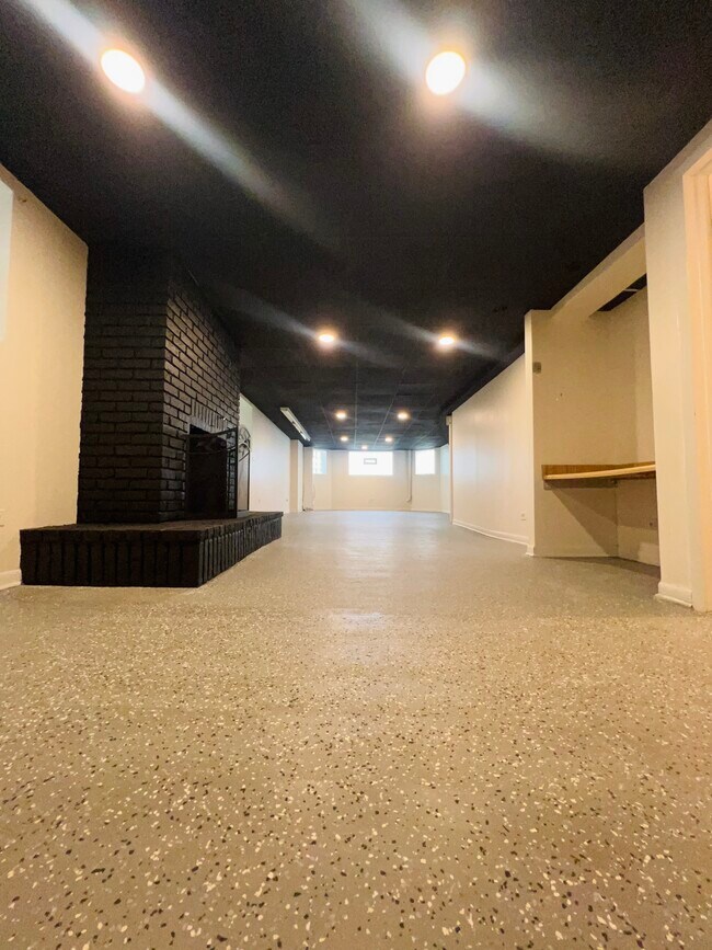 Apartment unit has two floors. Enjoy a modern lower level living space. Perfect for entertaining!