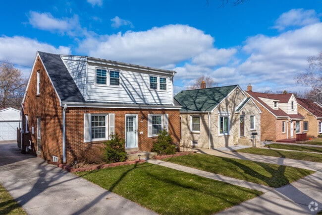 Brick Cape Cod homes are common in Milwaukee's Honey Creek Parkway neighborhood.