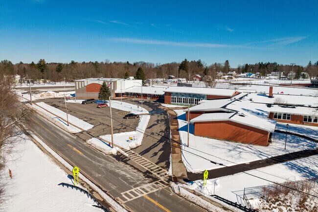 Mexico Elementary in Mexico's main entrance and bus circle.