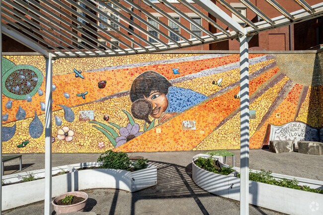 Colorful mural at the outdoor sitting area at Jonathan Burr Elementary School in Bucktown.