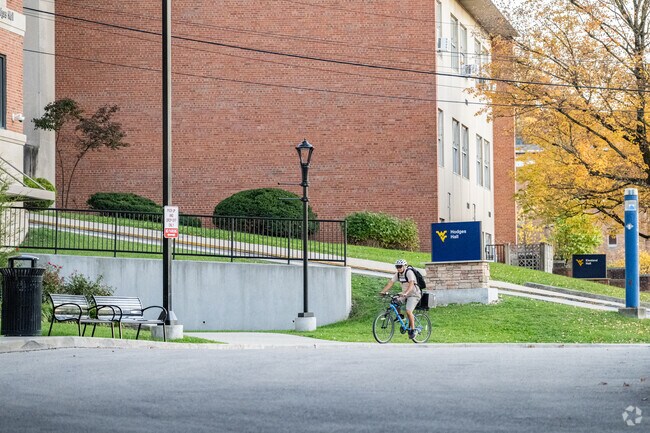 A man rides his bicycle around the Sunnyside neighborhood.