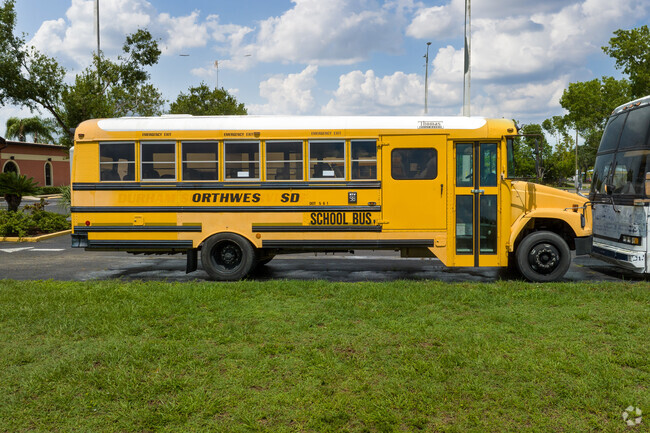 Palm Acres Charter High School in Lehigh Acres has their own bus transportation system.