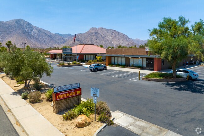 Visitors explore The Plaza Shopping Center in Borrego Springs for unique boutiques and relaxed desert vibes.
