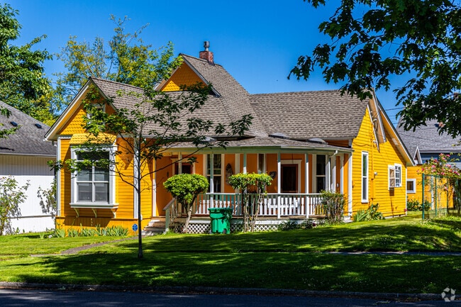 A stunning yellow craftsman style home in Downtown Olympia.