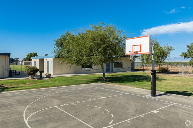 The students of Helm Elementary School can play a quick game of hoops with their friends.
