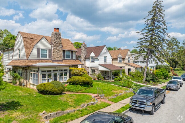 Wynnewood showcases Dutch Colonial architecture with steep gambrel roofs and classic wood detailing, adding historic charm to the neighborhood.