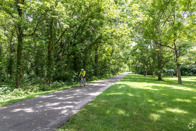 William Maxwell Rest Area, 4 miles from Xenia, has trails for biking and running under large trees.