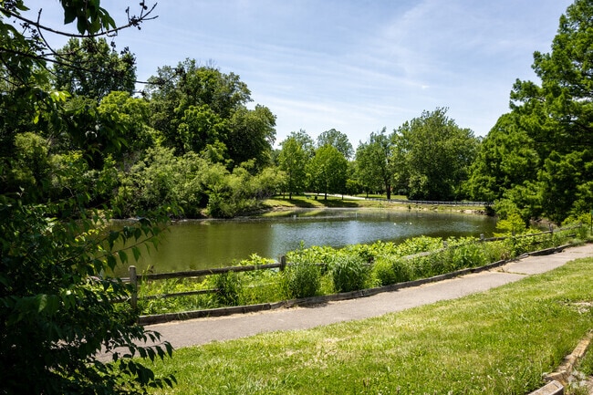 Krannert Park has a scenic lake with a walkway to enjoy the water.
