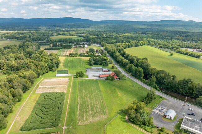 Saunderskill Farms has several greenhouses and an apple orchard.