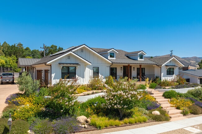 A large ranch style home in Highland overlooks the neighborhood and valley below.