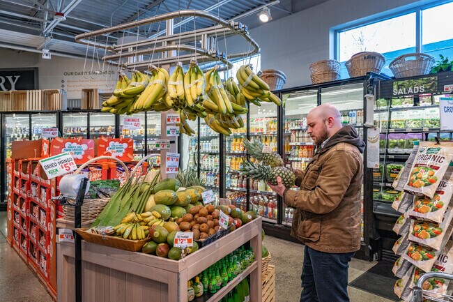 A Merriman Hills resident weighs his options at Mustard Seed Market & Cafe.