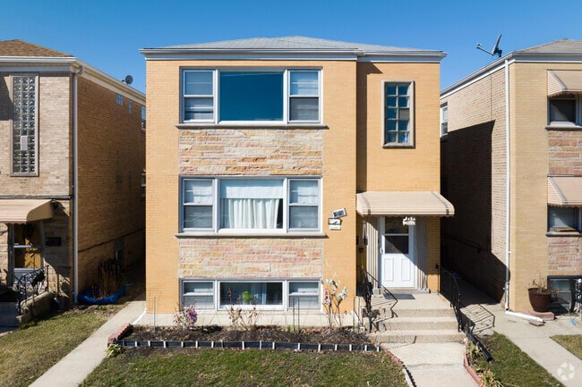 Brick two flats are seen throughout the Belmont Central.neighborhood.