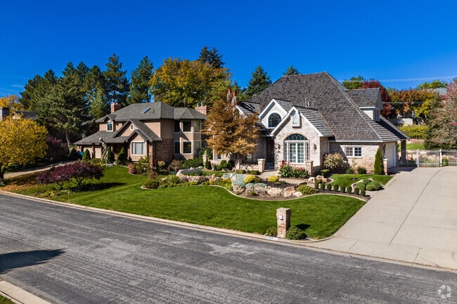 These spacious homes have charming details that blend well with the landscaped yards.