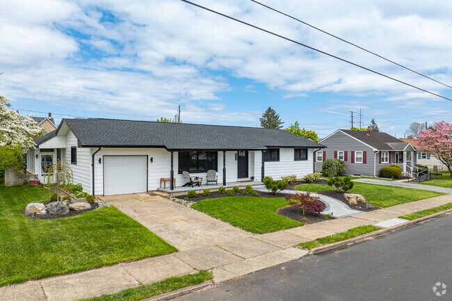 Ranch homes in Freemansburg often have attached garages with small driveways.