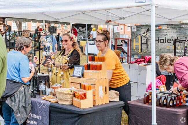 Petersburg residents shopping local honey products found at the RBC Pecan Festival.