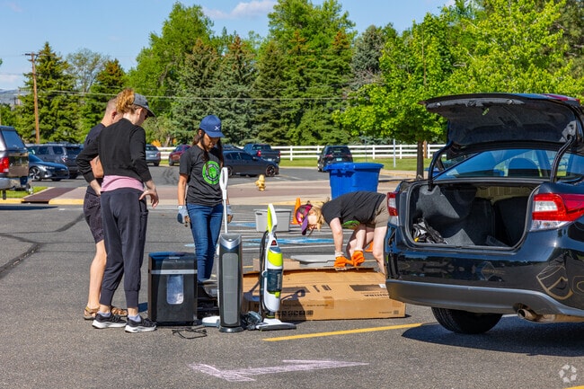 Locals head to the annual e-waste event in Applewood Villages to recycle their unwanted items.