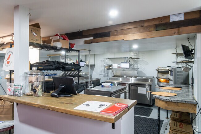 Pick up your favorite pizza from The Oven Pizza Co. in West Mayfield.