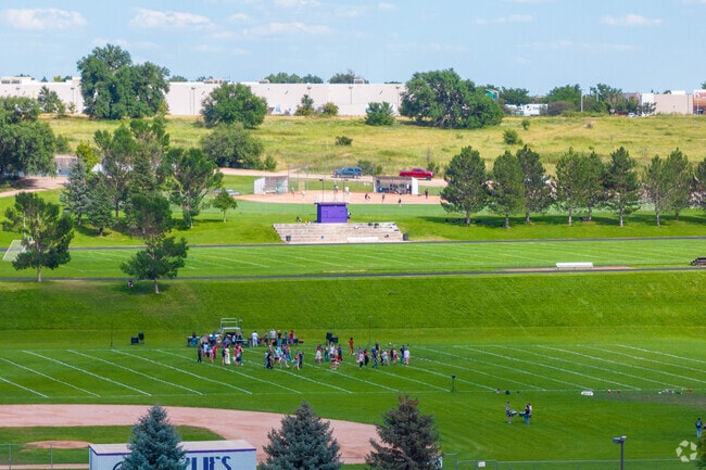 Mesa High School's bustling afterschool programs include softball and band.