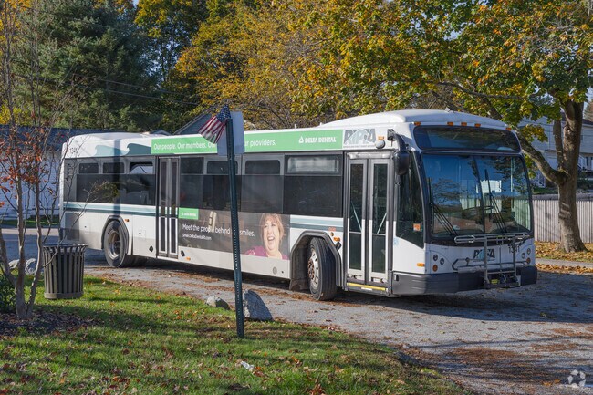 The RIPTA bus awaits passengers from the Rocky Point neighborhood at Warwick Neck Avenue.