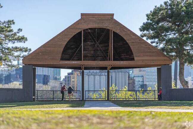 People enjoy the city and river views at father Hennepin Park.