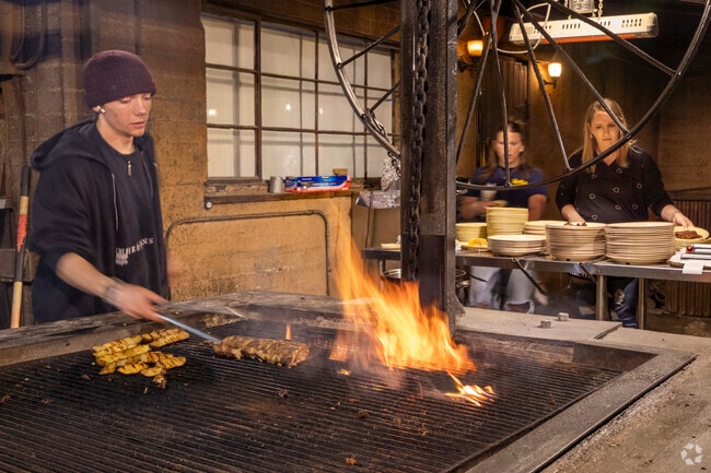 Li’l Abner’s Steakhouse cooks up tasty slabs of meat the old fashioned way, on an outdoor wood fired grill near Continental Reserve.