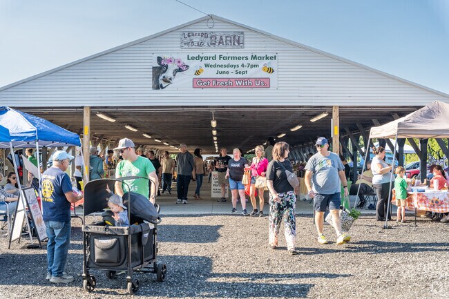 Support local farmers and feast on food trucks at Ledyard Farmers Market, CT.