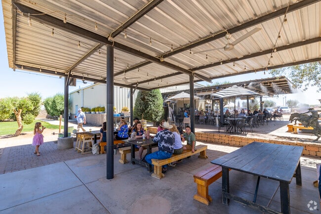 The Queen Creek Olive Mill is a local favorite near The Villages at Queen Creek, known for its homemade olive oils, seasonal dishes, and peaceful farm setting.