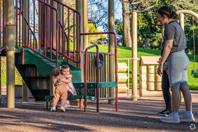 Toddlers making friend and memories on the playgrounds at Michigan Park in Whittier.