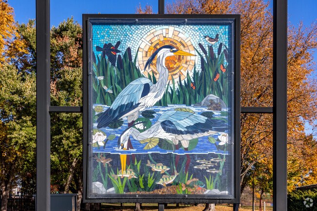 A glass mosaic art piece educates visitors at Eastman Regional Park near Southside.