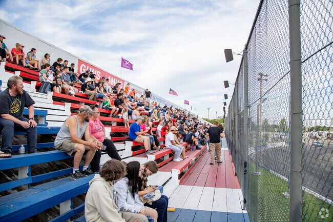 Fans cheer their favorite drivers at the Meridian Speedway.