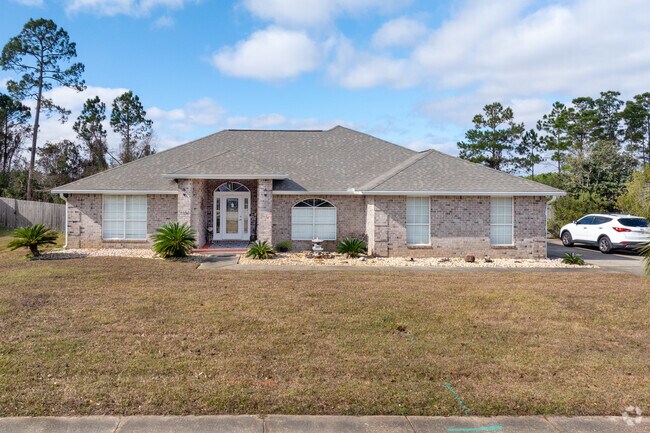 Many Orange Beach neighborhoods have traditional brick style homes.