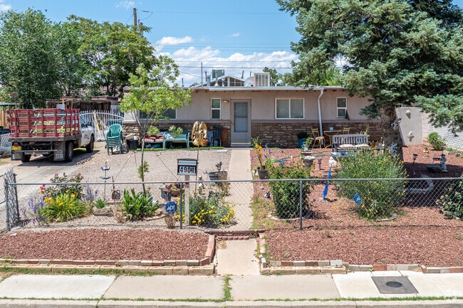 Discover the unique charm of Pueblo style homes blending with the landscape in McKinley.