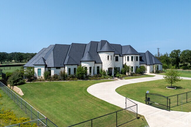 Large, custom homes can often come with private gates.