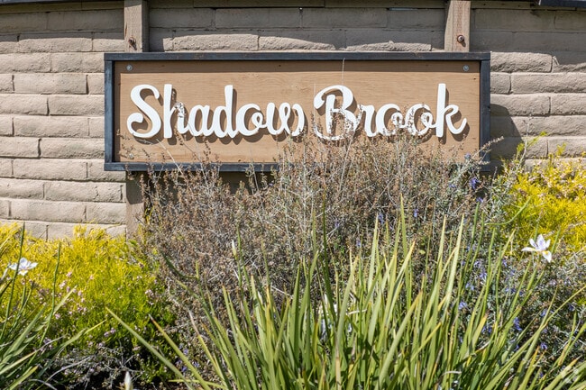 Shadow Brook’s welcoming signage reflects the neighborhood’s pride and established community feel.