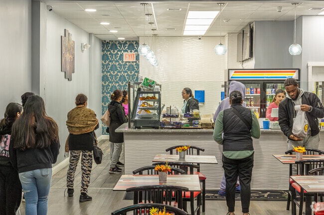 Pepperpot Restaurant in Elmont is a Caribbean restaurant where people make lines for take out.