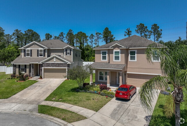 Contemporary two-story homes sit along the twin lakes in Grand Island.