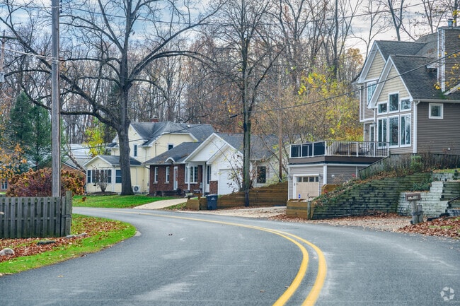A collection of small cottages sits across from Gull Lake in South Gull Lake.